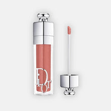 Load image into Gallery viewer, Applying Dior Addict Lip Glow to lips